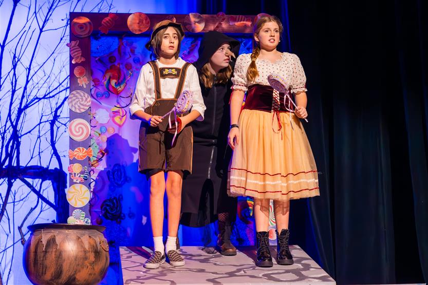 Students perform onstage